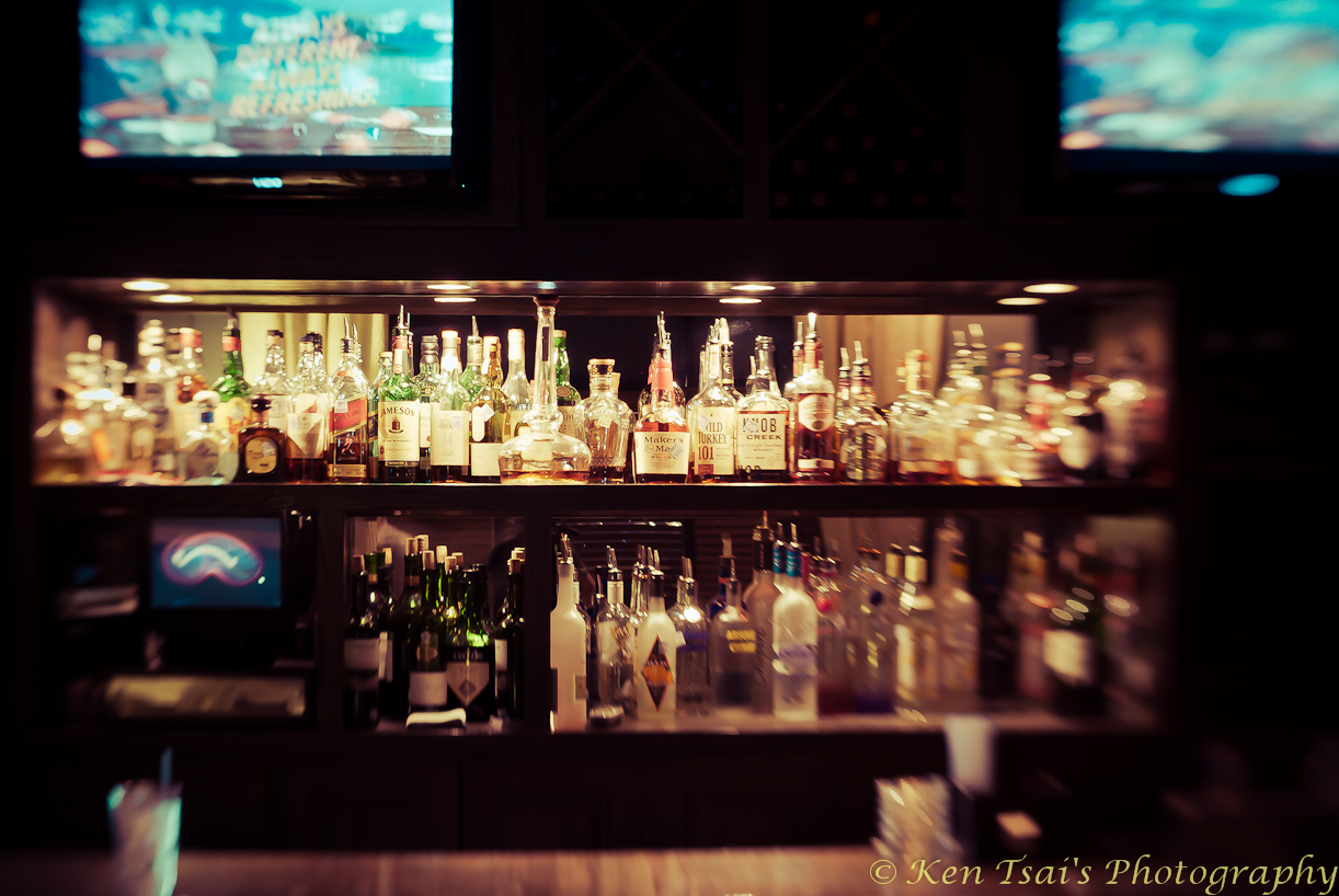 The Gas Light back bar lined with whiskey and spirits